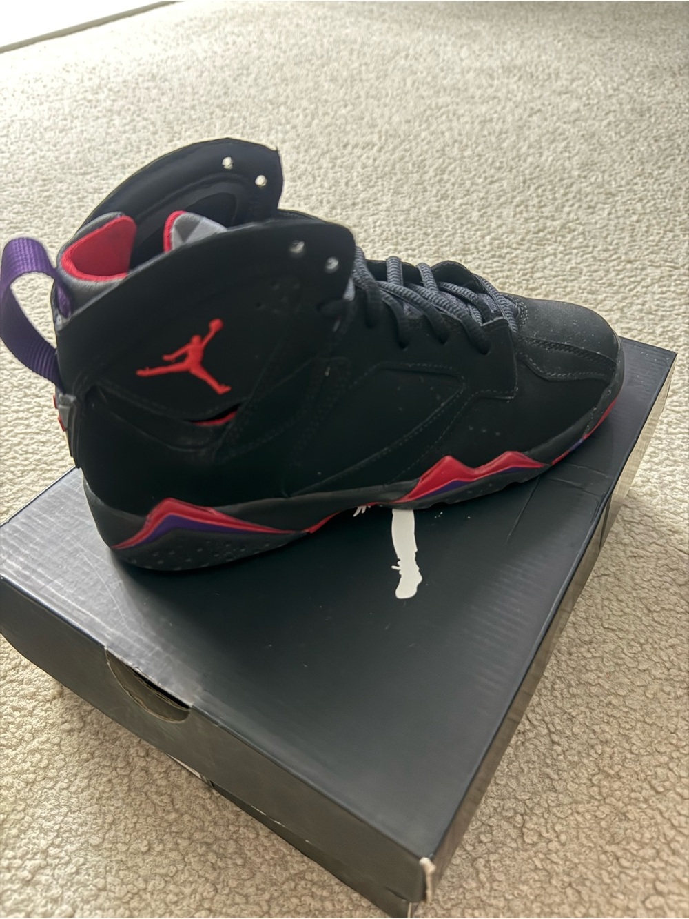 Jordan Air Jordan 7 Retro in Black with Red and Purple Accents